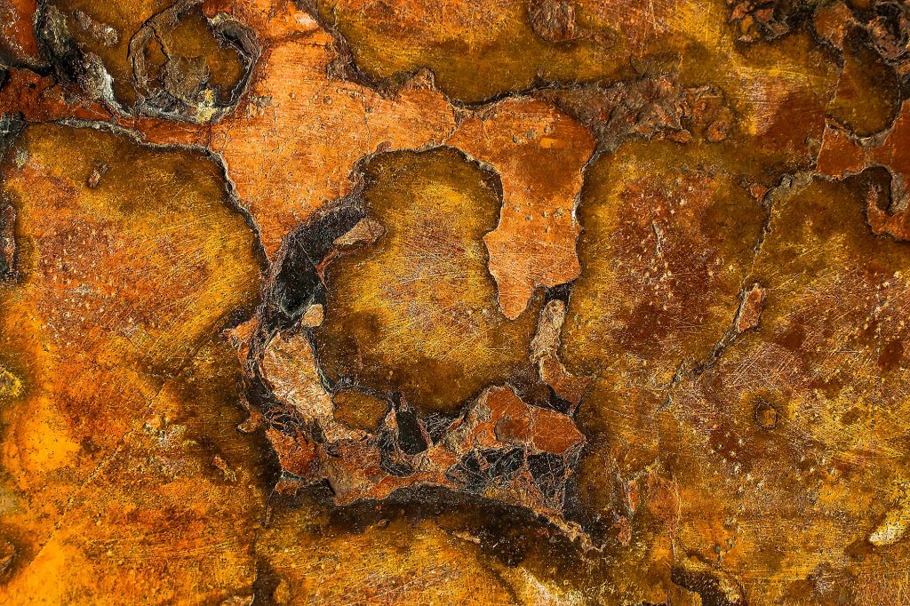 "AEAEA" - Abstract macro photography of rusted metal, capturing the essence of mythology and antiquity.